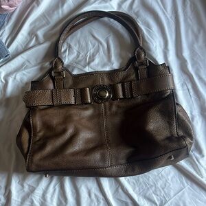 Almost new. Not too heavy. Great deal. Burberry purse.